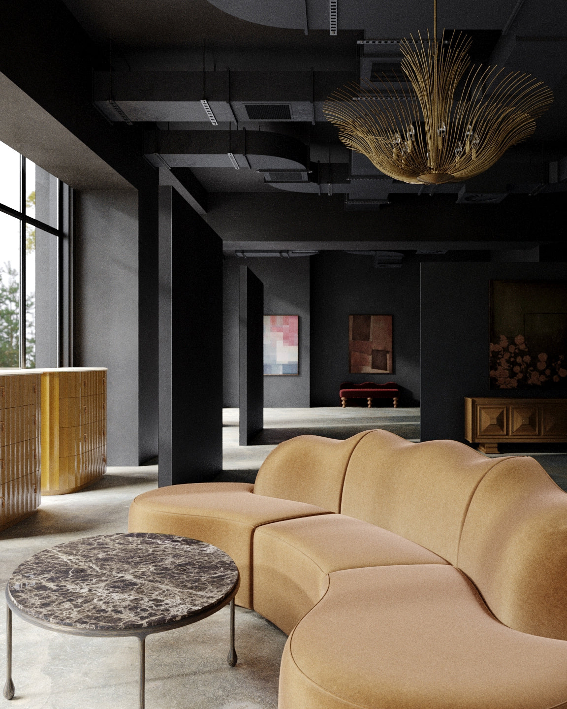 Lemieux et Cie’s new store at 161 Grand Street in Little Paris NYC features a sculptural camel sofa, dark marble table, gold chandelier, and moody black interior.