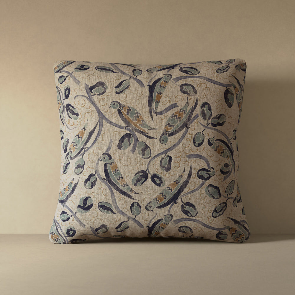 Linen accent pillow with French bird and botanical pattern in indigo, teal, and hazelnut on natural flax ground