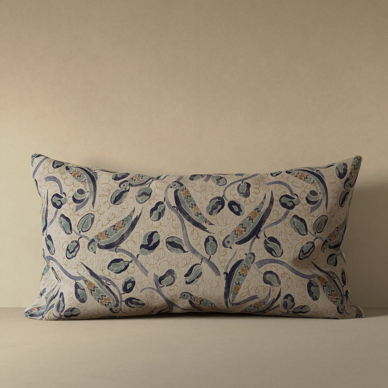 Linen accent pillow with French bird and botanical pattern in indigo, teal, and hazelnut on natural flax ground