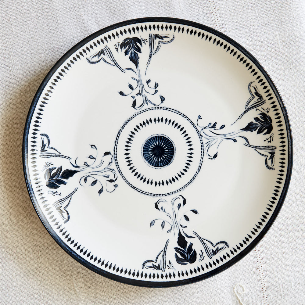 Lemieux et Cie Bruges Porcelain Dinner Plate in hand-painted blue and white floral motifs, ceramic dinnerware shown on neutral linen textile.