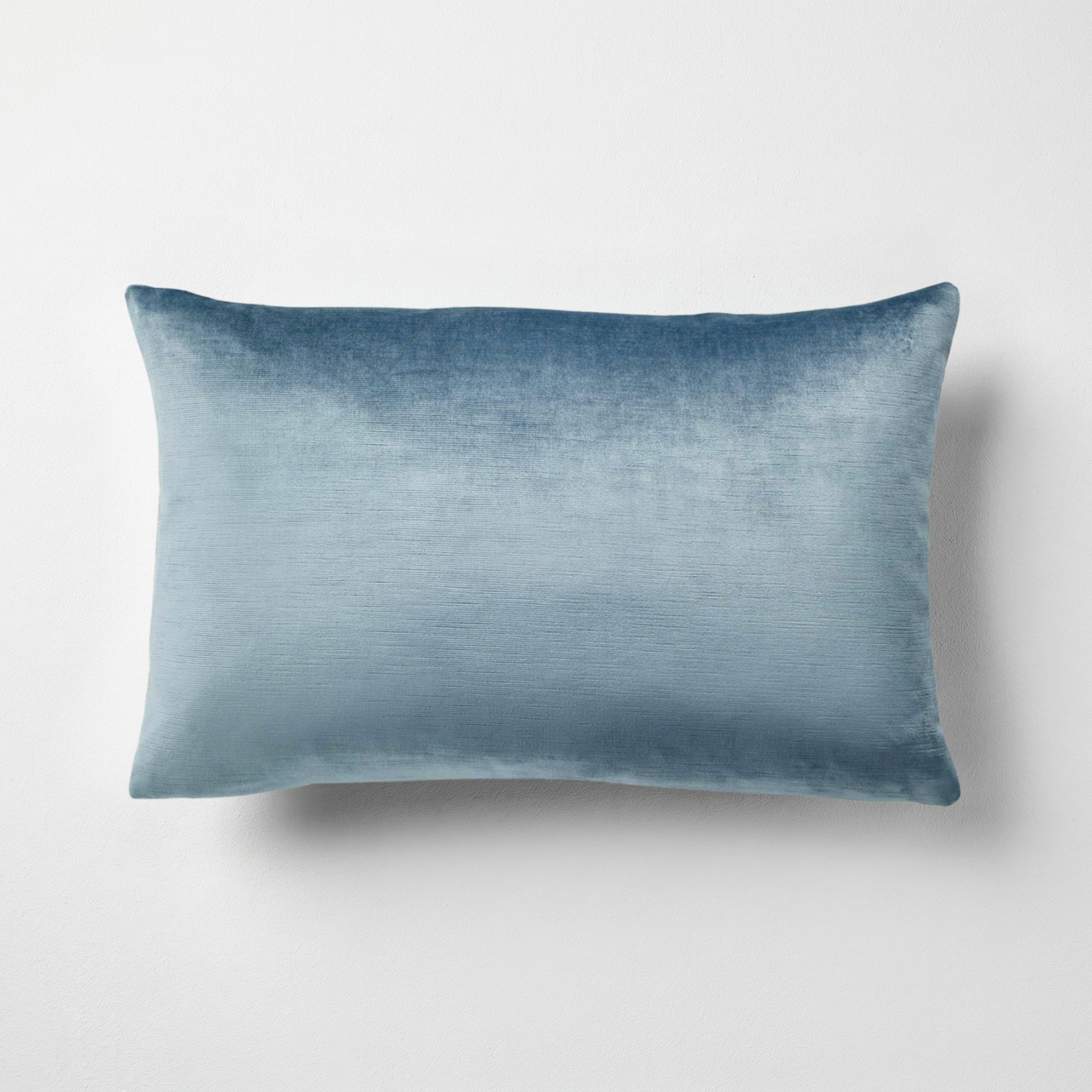 Naomi solid velvet lumbar pillow in wedgewood, 14 by 22 inches, with a subtle sheen and striated pile