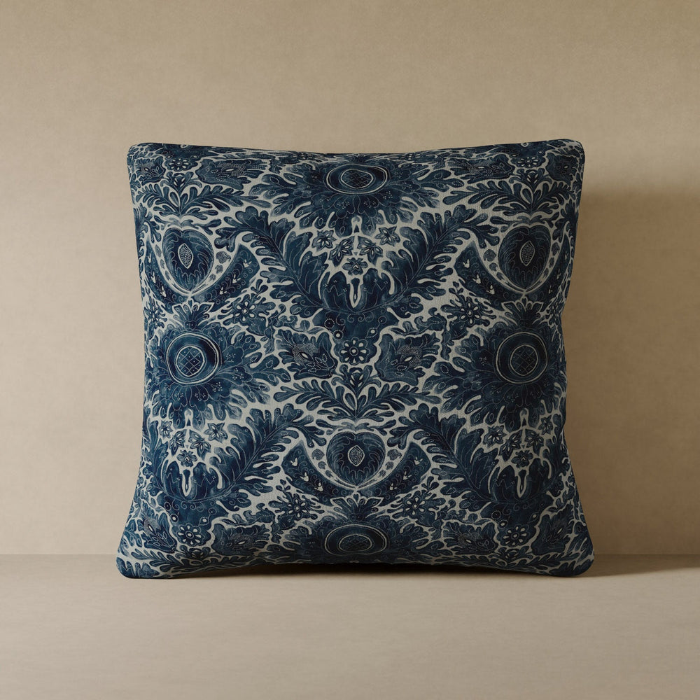 Lemieux et Cie Toile De Rouen Velvet Pillow in indigo and ivory performance velvet, decorative pillow with heritage French motifs, shown against warm neutral wall.