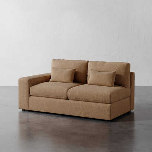 Lemieux Et Cie Lacroix Left or Right Arm Loveseat A dark green Lacroix left or right arm loveseat with two seat cushions and two bolster pillows, set against a neutral background.