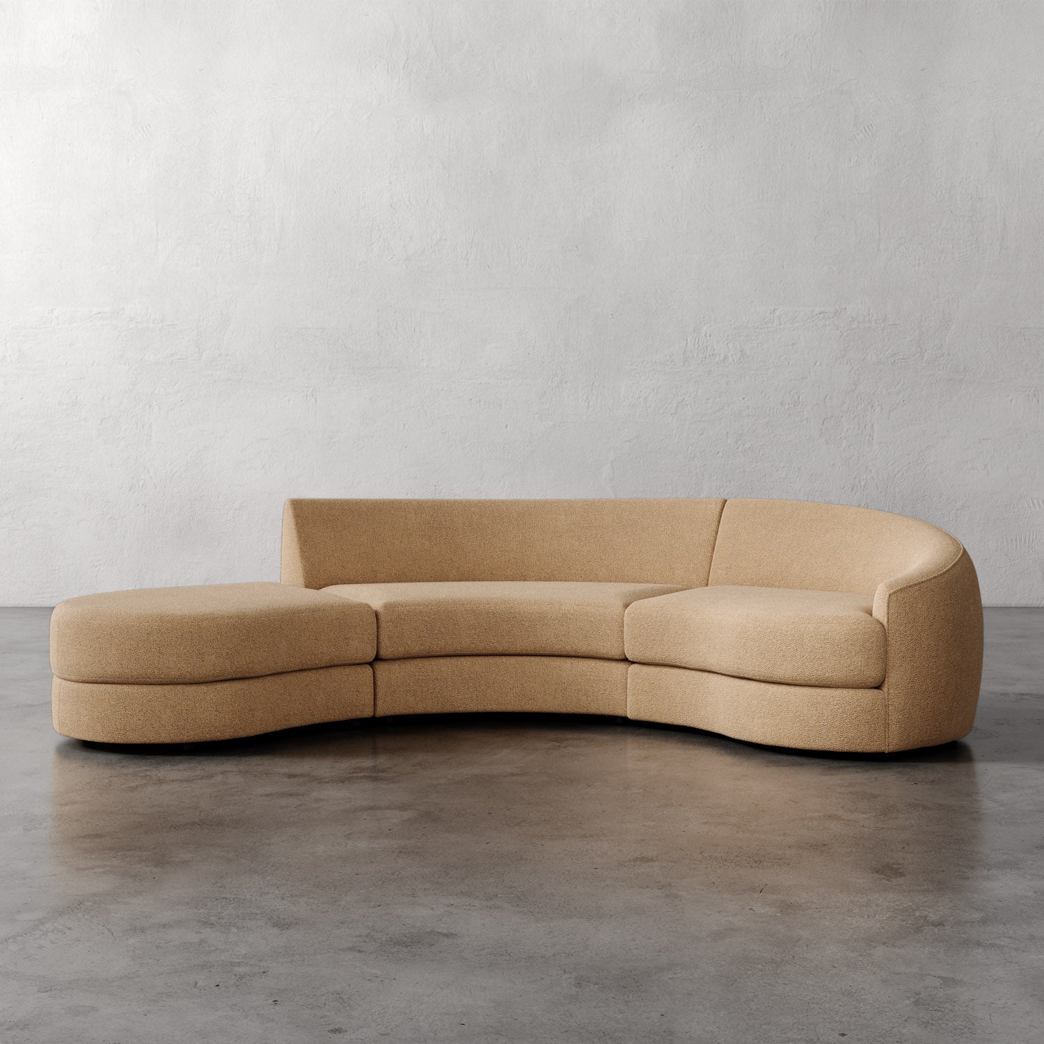 Lemieux Et Cie Rulmann 3-Piece Right Sectional Beige curved sofa on a gray floor with a plain white wall background