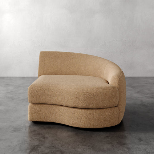 Lemieux Et Cie Rulmann Right Arm Chair Beige armchair on a gray floor with a plain wall background