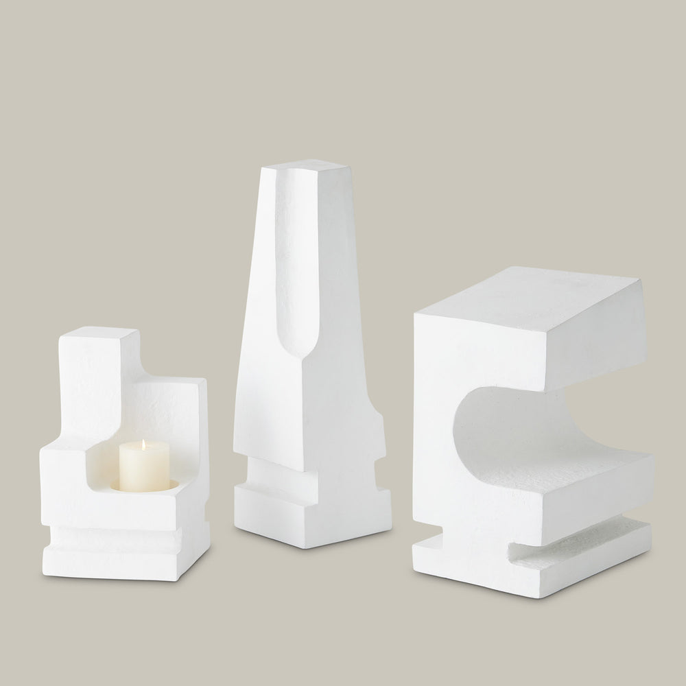 Lemieux et Cie La Structure Sculptures in white, geometric sculptural objects in matte finish, shown on neutral backdrop with warm light
