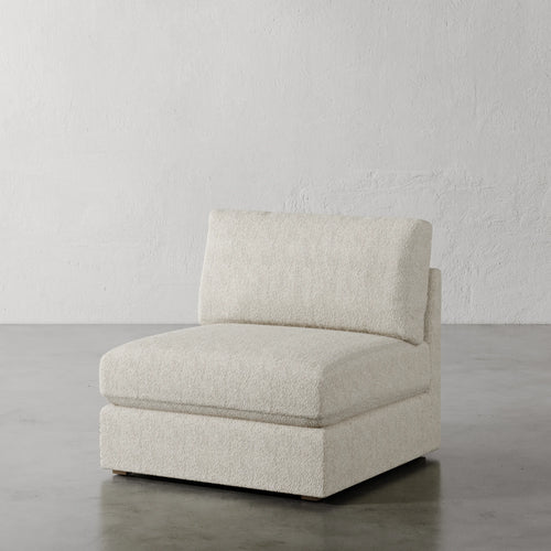 Lemieux Et Cie Chanaux Armless Chair
Beige armchair on a gray floor with a white wall background