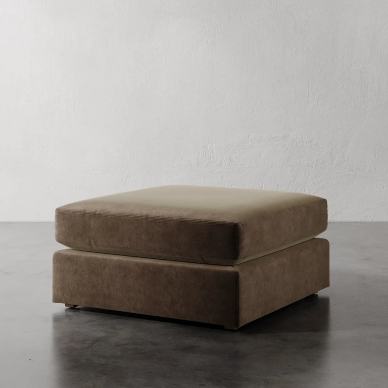 Lemieux Et Cie Chanaux Ottoman
Brown ottoman on a gray floor with a white wall background