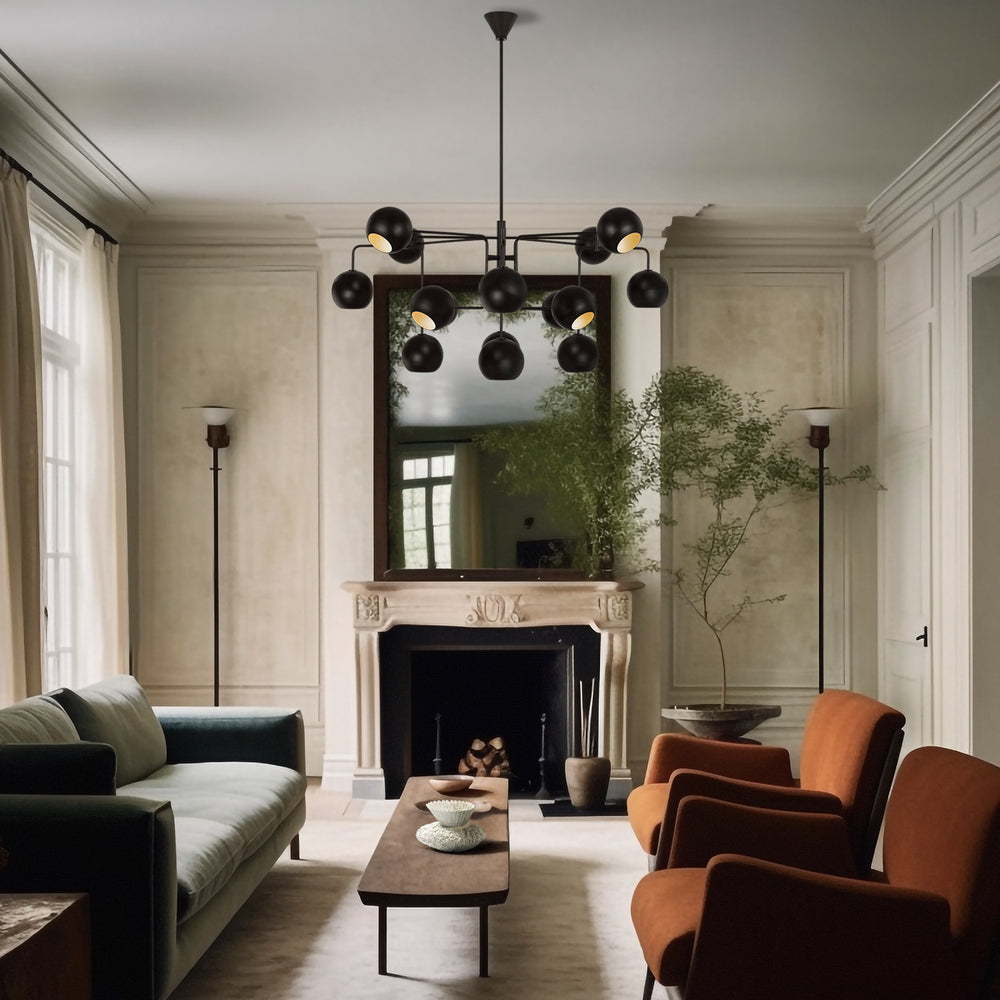 Lemieux et Cie Chaumont 16 Light Extra Large Chandelier in aged iron, a designer lighting fixture adding soft glow to a refined room with classic molding and calm furnishings.