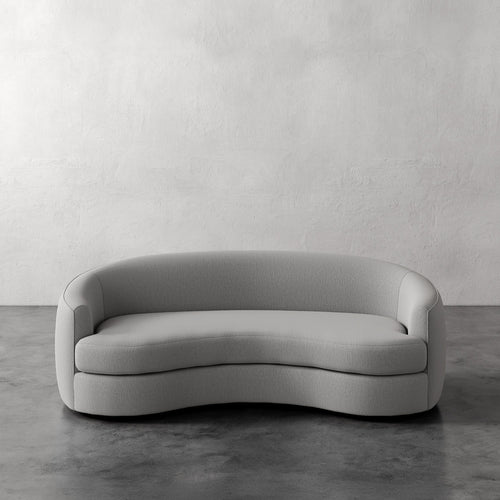 Lemieux Et Cie Rulmann Sofa Gray sofa against a plain white wall
