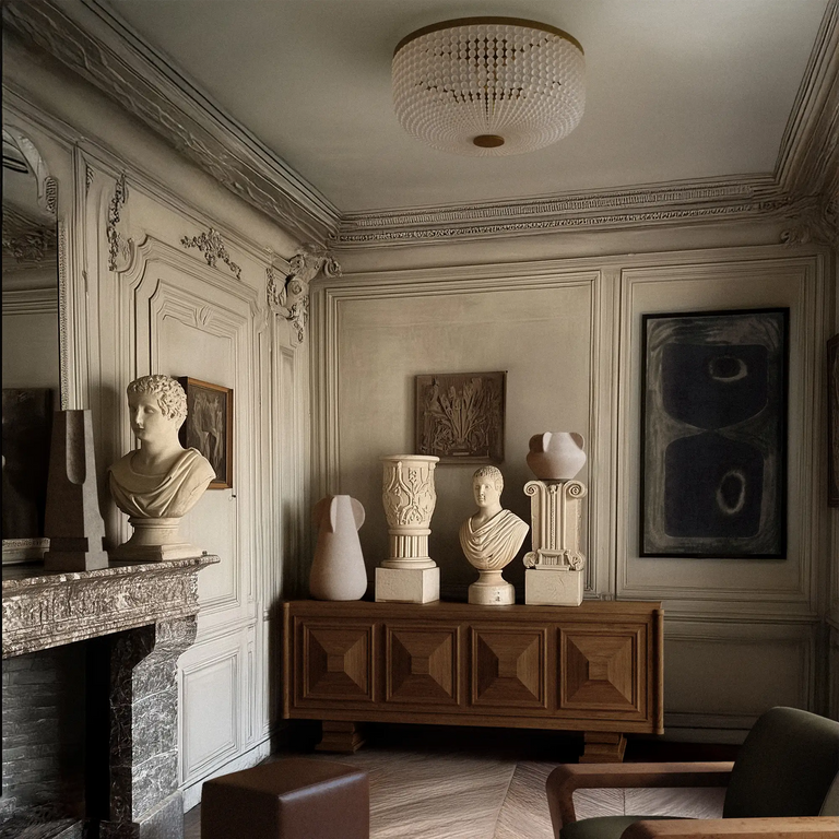 Lemieux et Cie Bellecour Flush Mount in vintage gilded brass with hand-strung crystal beads, ceiling fixture in ornate sitting room with carved moldings and wood credenza.