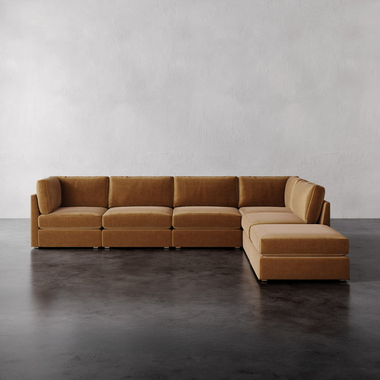 Lemieux Et Cie Chanaux 6-Pc Sectional
Brown sectional sofa on a dark floor with a light gray wall background