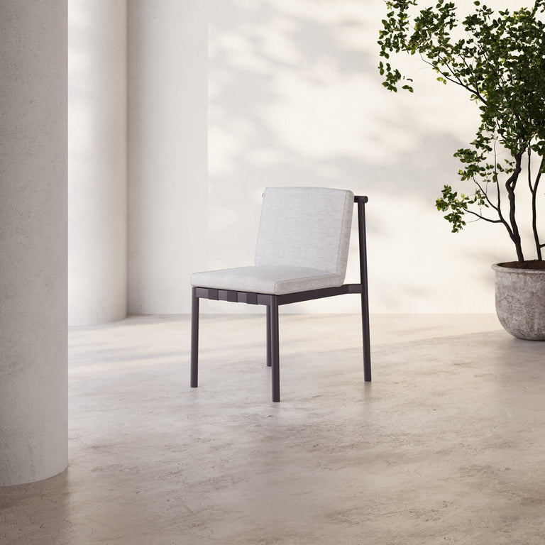 Lemieux Et Cie Hudson Dining Chair HudsonChair A modern dining chair with a gray aluminum frame and white faux leather seat, part of the Hudson Outdoor Collection.