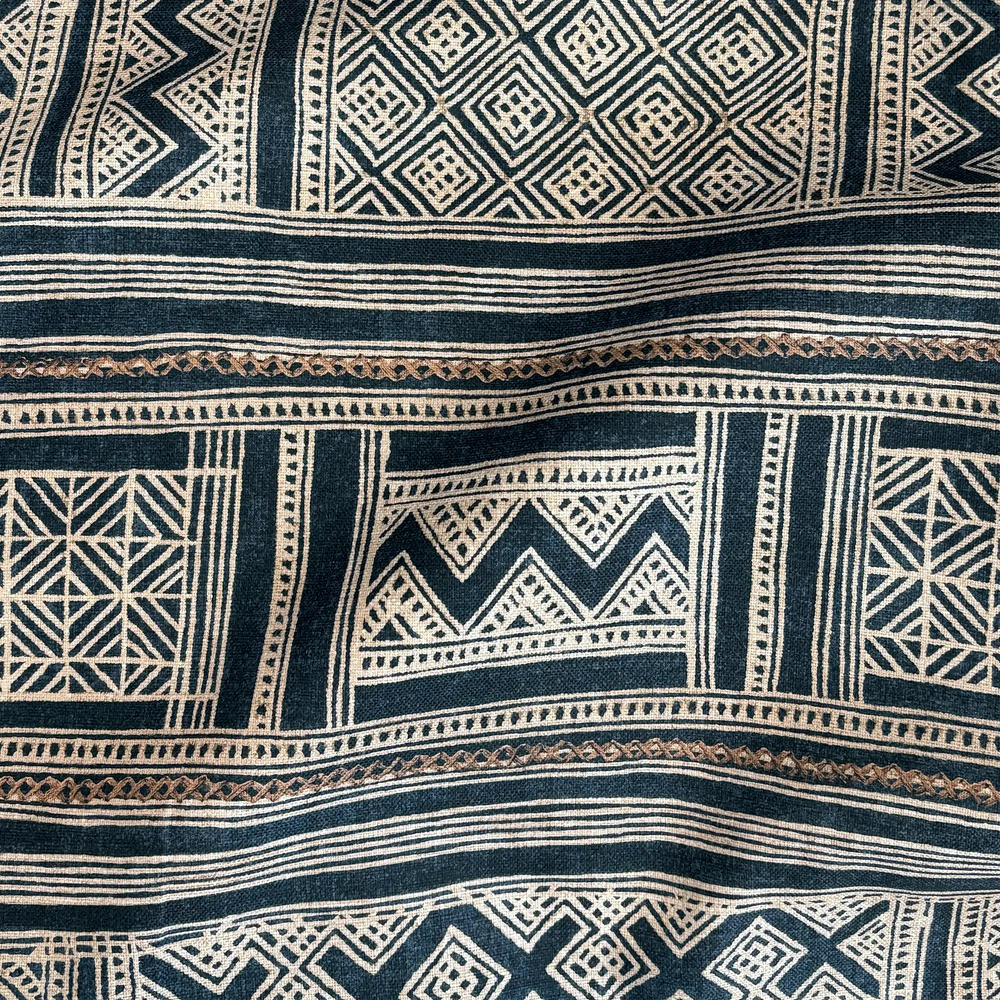 Lemieux et Cie Indigo Inlet Outdoor Pillow, geometric woven pattern in deep indigo and ivory, shown in detail close-up.