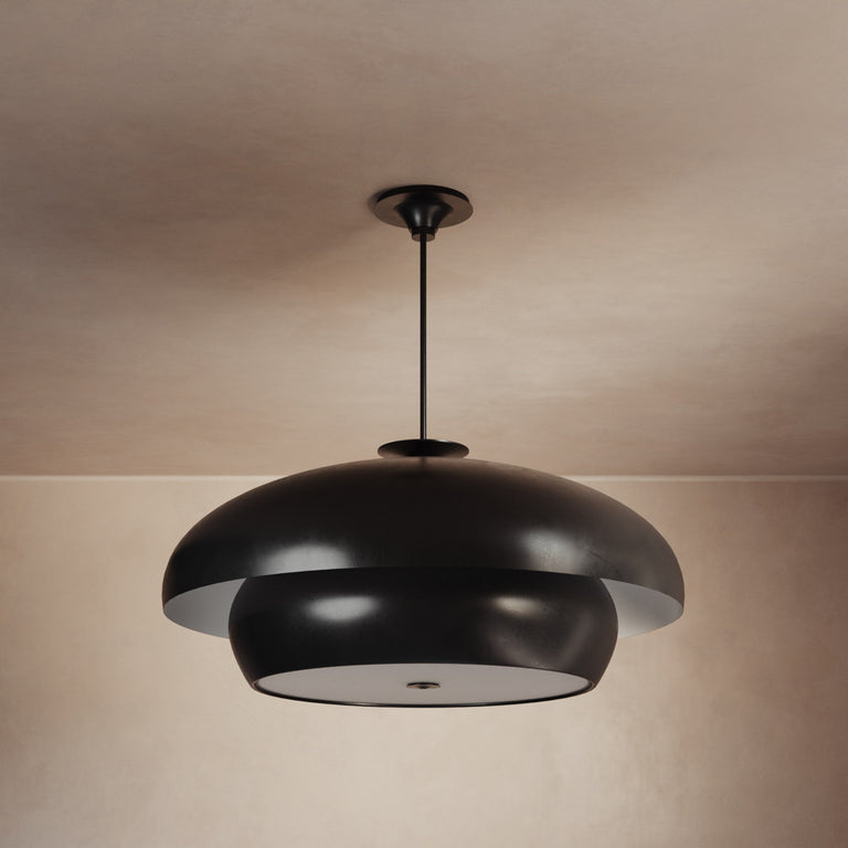 Lemieux et Cie Solene Chandelier in dark matte finish, sculptural pendant with layered dome form, hung from warm plaster ceiling in soft light.