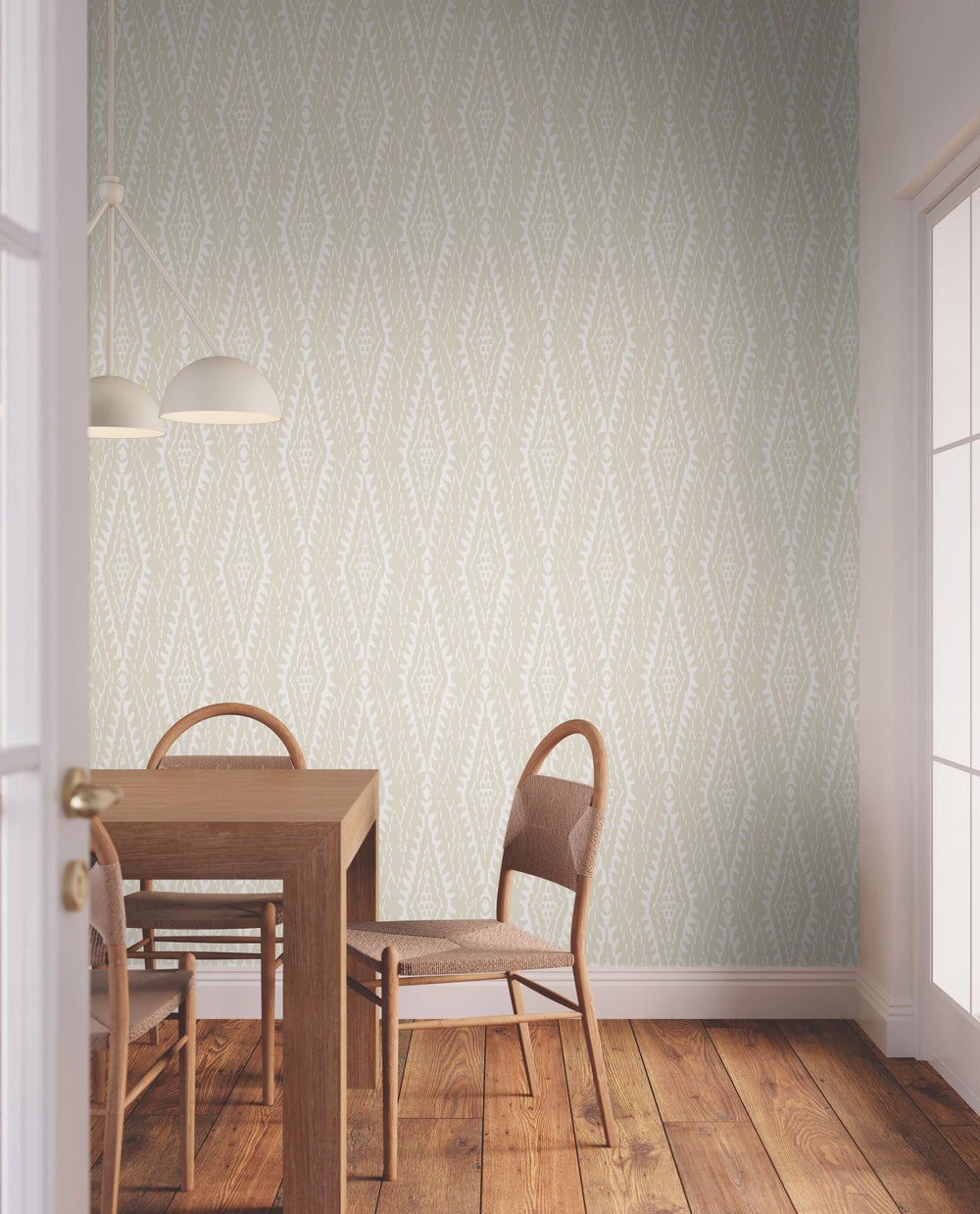 Lemieux et Cie Rousseau Paperweave in charcoal gray with khaki beige, diamond tapestry weave wallpaper, shown in a dining room with wood floors and pendant lighting.