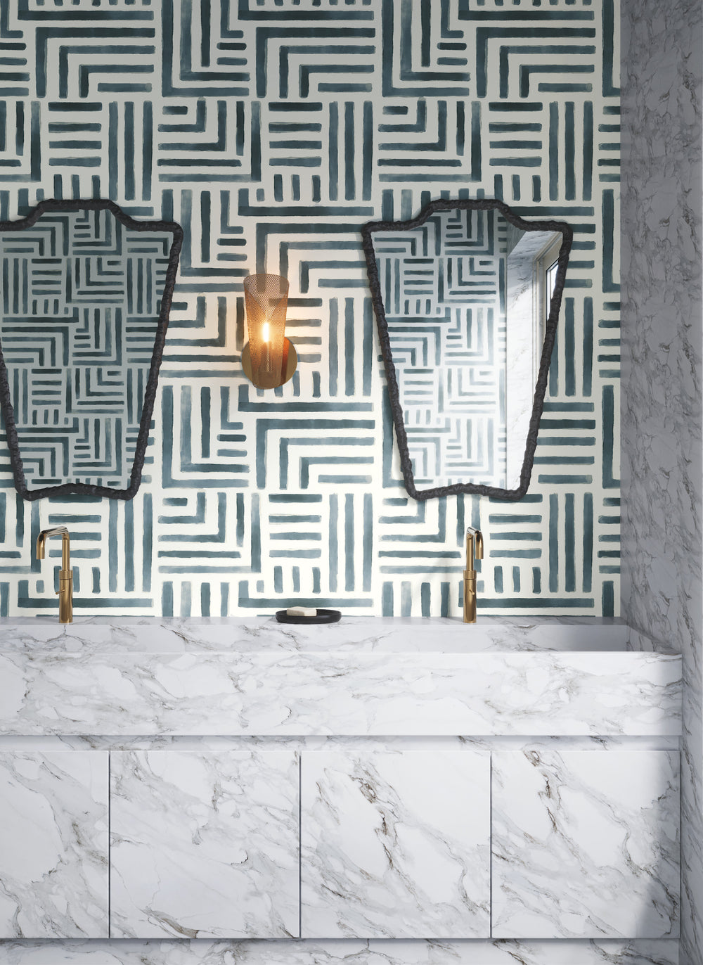 Lemieux et Cie Painterly Labyrinth wallpaper in beige and blue geometric pattern, bathroom installation with marble vanity and brass fittings.