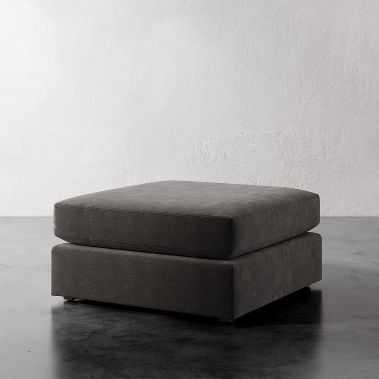 Lemieux Et Cie Chanaux Ottoman
Gray ottoman on a reflective surface with a white background