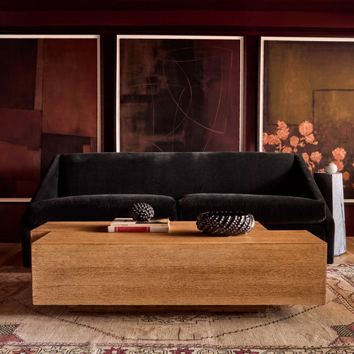 Lemieux et Cie Modern living room with Fontaine Sofa, La Brume Limited Edition Art Print, Le Havre Limited Edition Art Print,  Vigne Fleurie Limited Edition Art Print, and a coffee table.