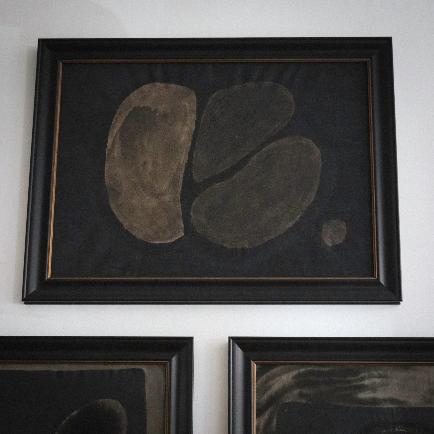 Lemieux et Cie Pierre Emmanuel Martin original oil and mixed media painting, framed abstract composition with organic forms on dark ground, hung on white wall
