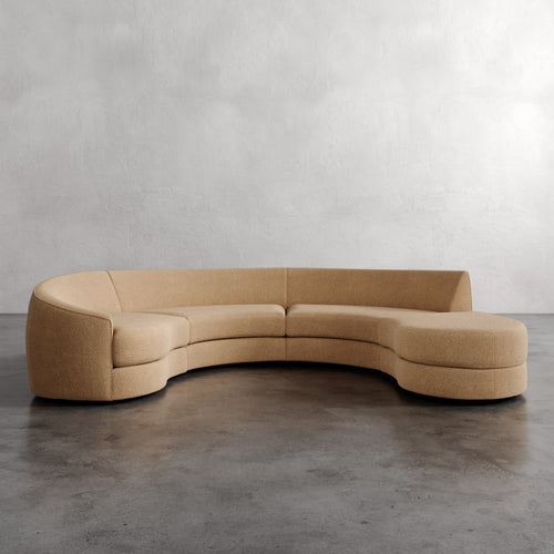 Lemieux Et Cie Rulmann 4-Piece Left Sectional Beige curved sofa against a plain wall
