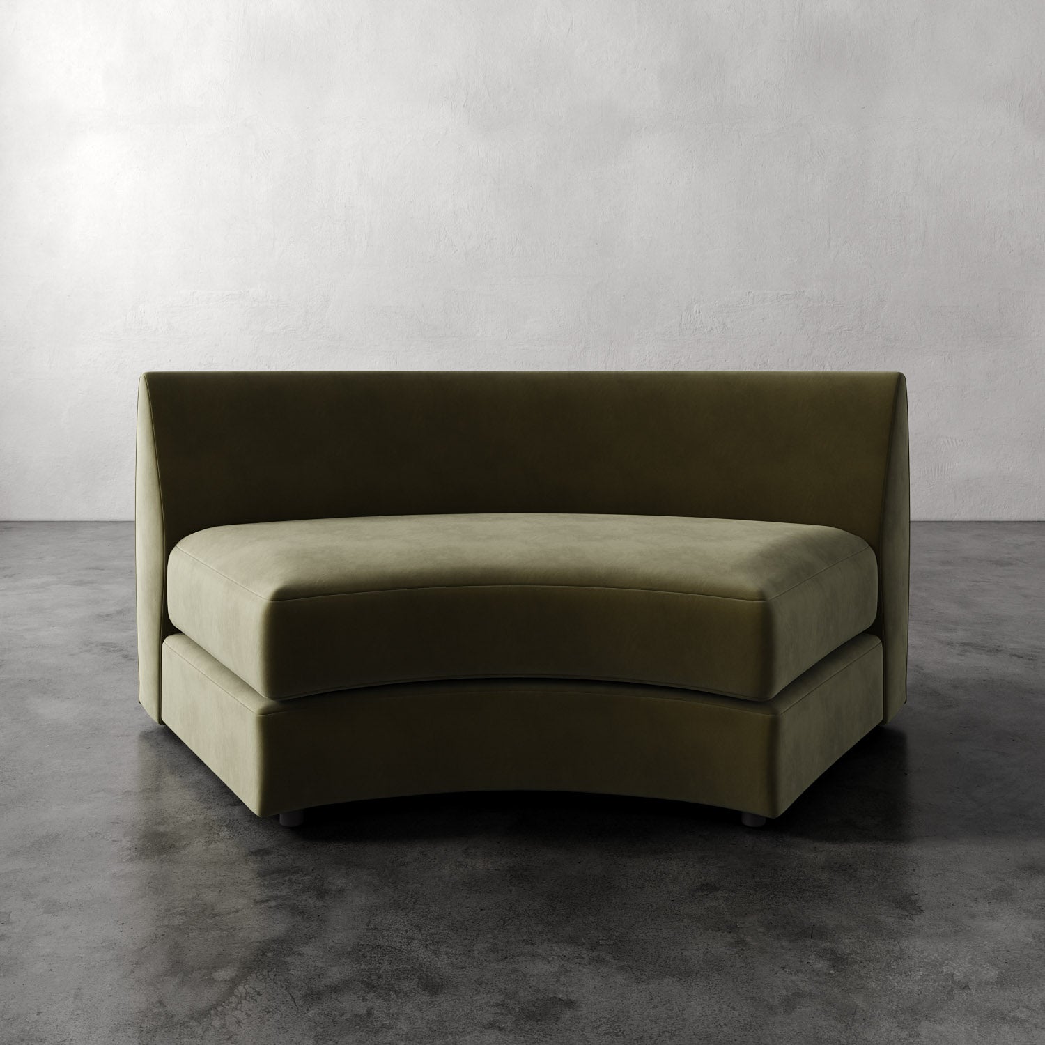 Lemieux Et Cie Rulmann Wedge Modern olive green sofa against a plain wall.