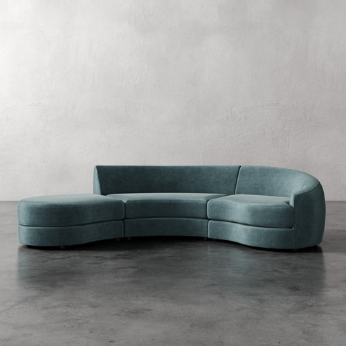 Lemieux Et Cie Rulmann 3-Piece Right Sectional Modern teal sofa against a plain wall