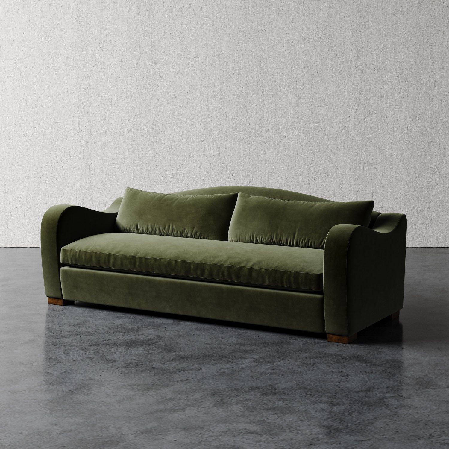 Lemieux Et Cie Elodie Sofa - Bench Seat (Made-to-order) Green sofa on a gray floor with a white wall background