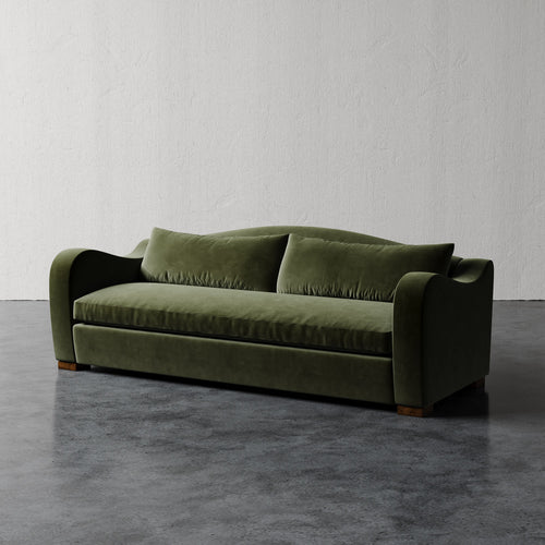 Lemieux Et Cie Elodie Sofa - Bench Seat (Made-to-order) Green sofa on a gray floor with a white wall background