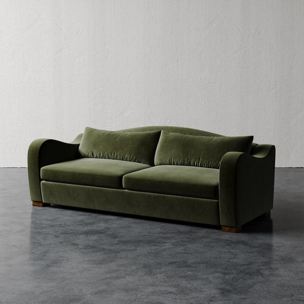 Lemieux Et Cie Elodie Sofa (Made-to-order) Green sofa on a gray floor with a white wall background