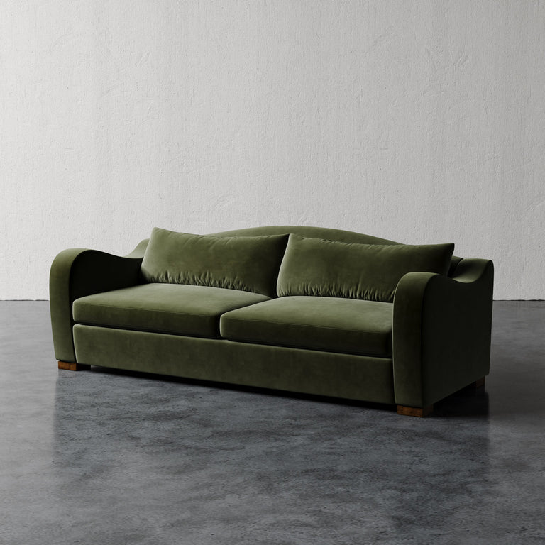 Lemieux Et Cie Elodie Sofa (Made-to-order) Green sofa on a gray floor with a white wall background