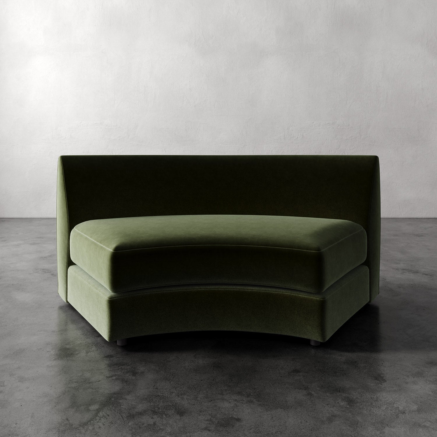 Lemieux Et Cie Rulmann Wedge Modern green sofa against a plain wall