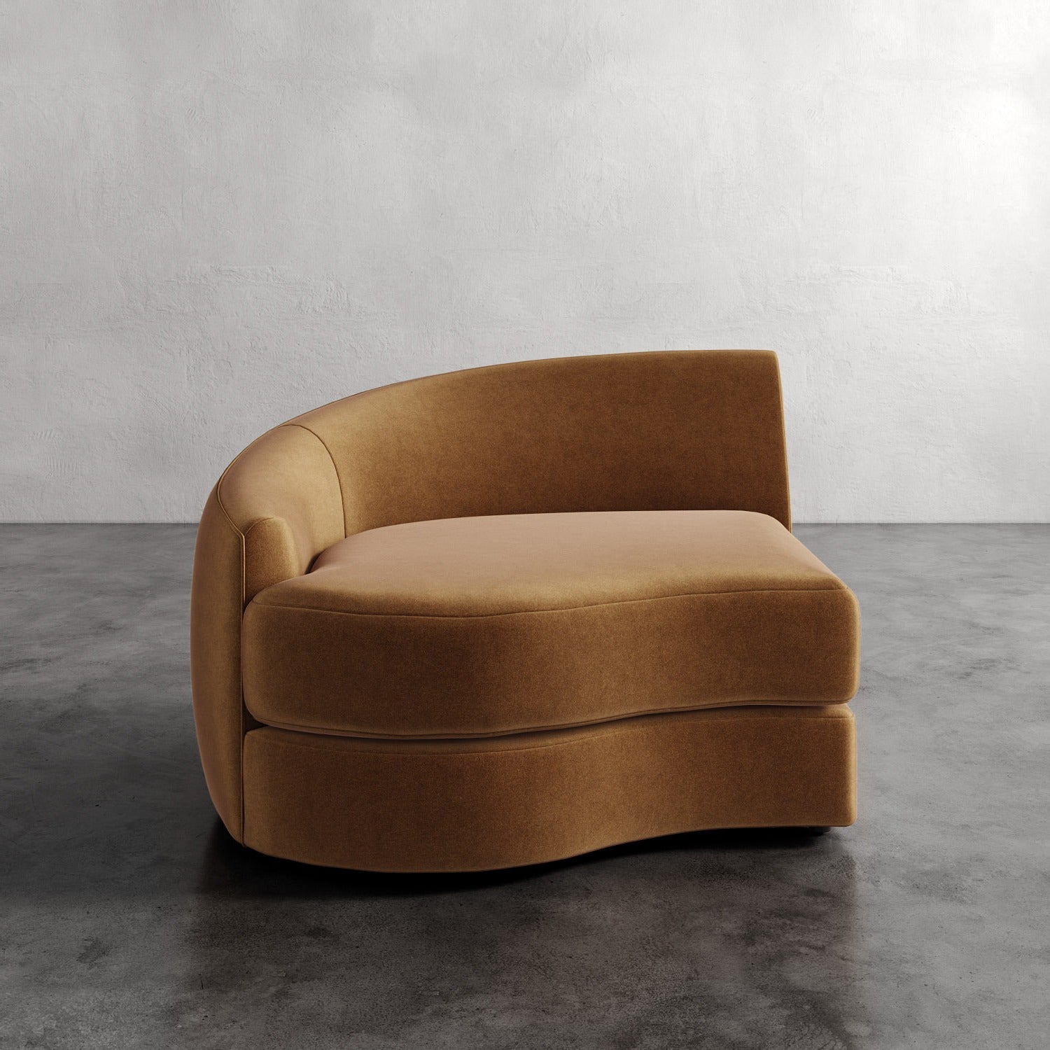 Lemieux Et Cie Rulmann Left Arm Chair Brown curved sofa on a gray floor with a neutral wall background