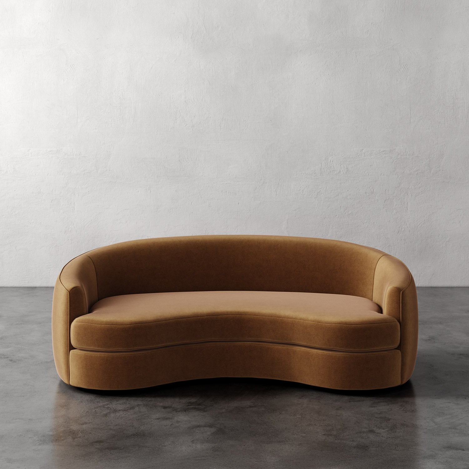 Lemieux Et Cie Rulmann Sofa Brown curved sofa against a plain wall