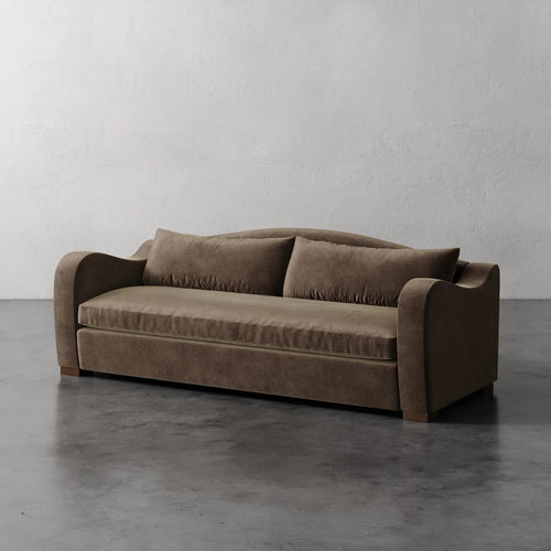 Lemieux Et Cie Elodie Sofa - Bench Seat (Made-to-order) Brown sofa against a plain white wall