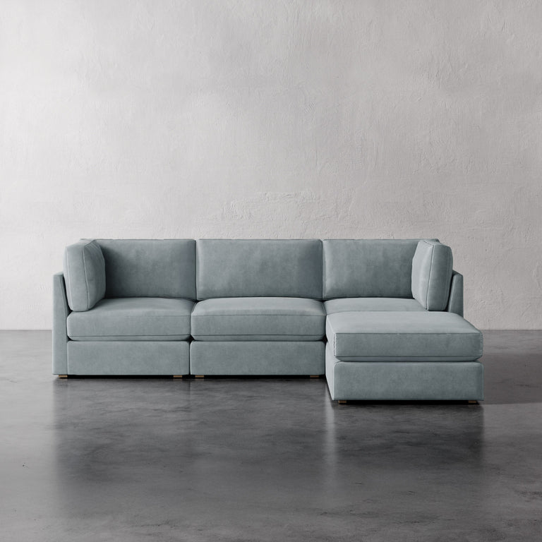 Lemieux Et Cie Chanaux 4-Pc Sectional
Gray sectional sofa on a concrete floor with a light gray wall background