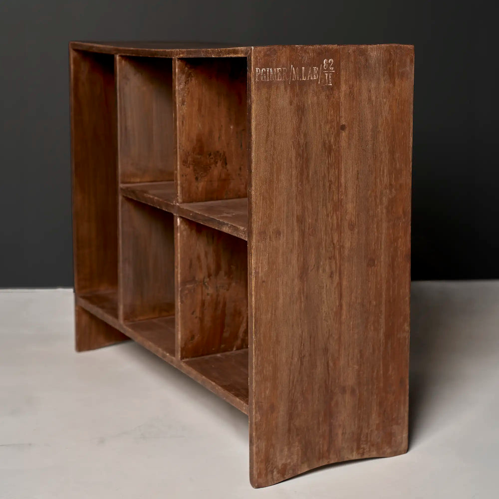 Lemieux et Cie Pierre Jeanneret PJ-R-27 five-hole file rack in solid teak - three-quarter studio view showing the open compartments and side-panel legs, the PGIMER/M.LAB/82/II stencil visible