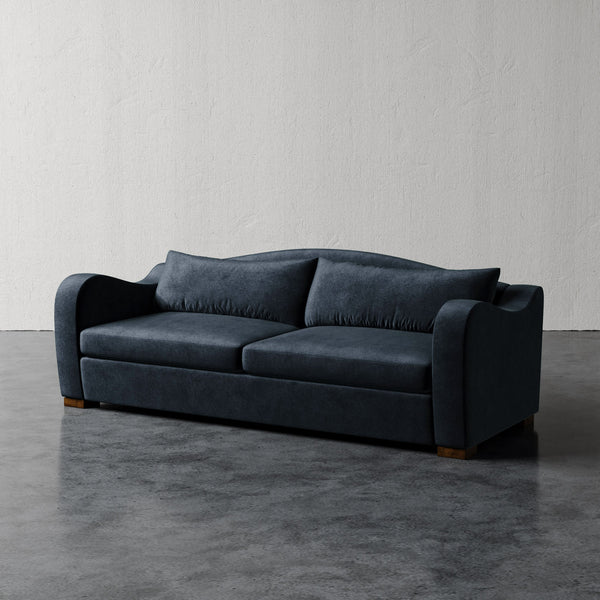 Lemieux Et Cie Elodie Sofa (Made-to-order) Blue sofa against a plain white wall