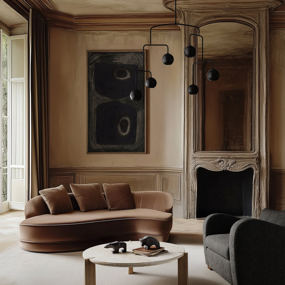 Lemieux et Cie Pierre Emmanuel Martin Limited Edition Print B1, abstract artwork in dark tones, hung in wood-paneled sitting room with sculptural chandelier and curved sofa.