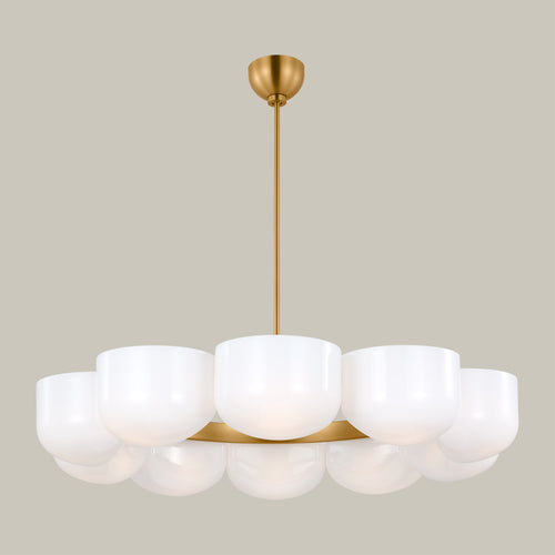 Lemieux et Cie Cheverny Large Chandelier, a designer lighting fixture with white milk glass shades and a burnished brass stem, shown at an angle.