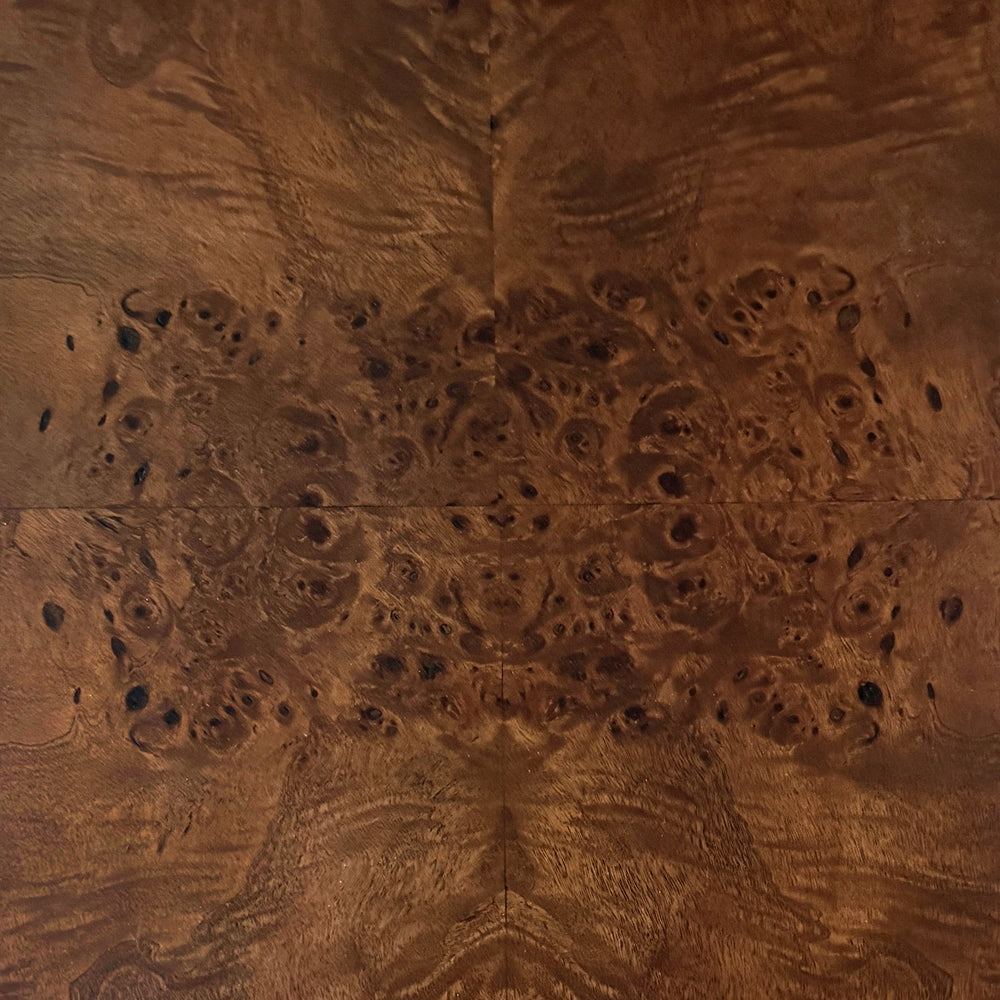 Lemieux et Cie Walnut Mappa Burl Finish swatch in warm walnut-stained wood with organic knotted grain pattern shown in warm ambient light