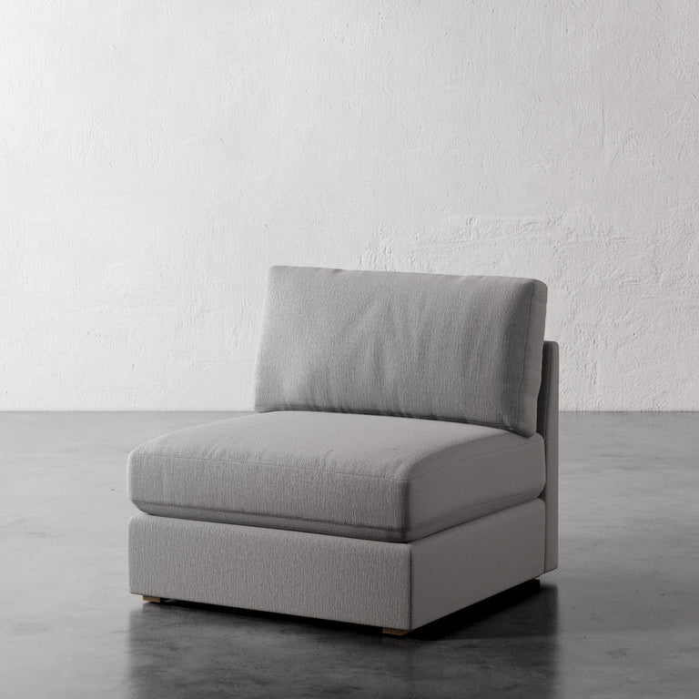 Lemieux Et Cie Chanaux Armless Chair
Gray sofa chair on a white background