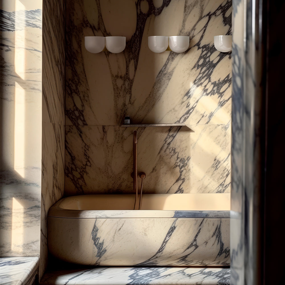 Lemieux et Cie Cheverny medium sconce in burnished brass with paired milk glass bowl shades above the bathtub and next to a window on the left, a luxury lighting fixture that brings a calm, relaxing feel to the space.