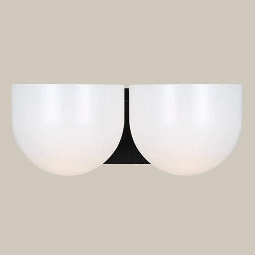 Lemieux et Cie Cheverny medium sconce in aged iron, a designer lighting fixture with paired milk glass bowl shades and an aged iron backplate, shown front facing.