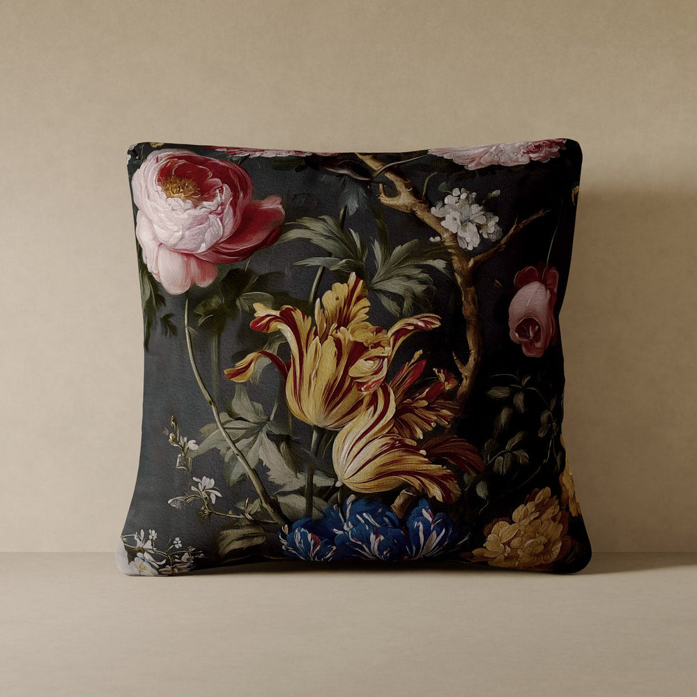 Lemieux et Cie Dutch Rose Velvet Pillow in dark floral print with blush and gold blooms, square cushion shown against neutral wall