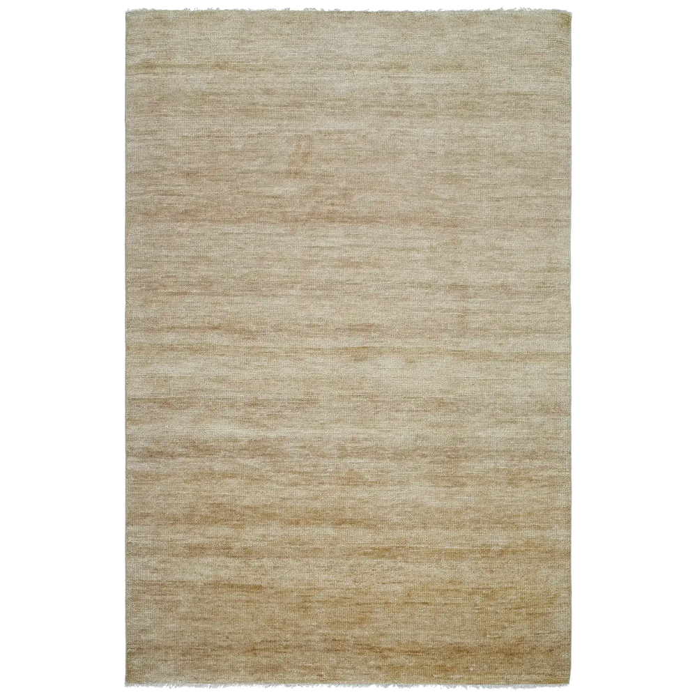 Lemieux et Cie Rochefort Handmade Wool Rug in flax, hand-knotted wool and cotton rug with subtle texture and fringe, shown on white studio backdrop.