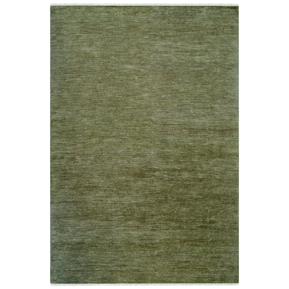 Lemieux et Cie Rochefort Handmade Wool Rug in olive green, handwoven rug with textured surface and fringed edges, shown on white studio backdrop.