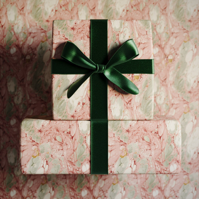 Lemieux et Cie Rosso Portogallo designer wrapping paper with marbled blush, celadon, and gold patterning.
