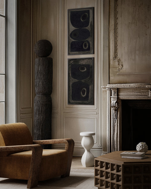 Lemieux et Cie Pierre Emmanuel Martin Limited Edition Print B2, fine art print with organic circular motifs in dark tones, hung in a Parisian-style sitting room with carved stone fireplace and paneled walls.