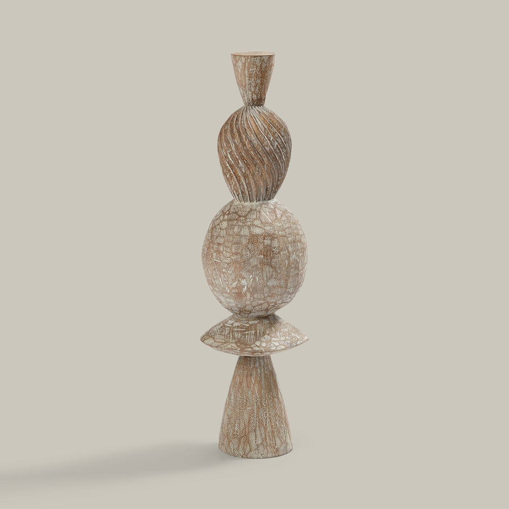 Lemieux et Cie Chapon Pillar, sculptural stacked wood form with varied textures and warm patina, shown on neutral studio backdrop.